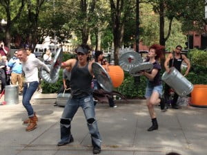Village-based dance/percussion group performs at rally